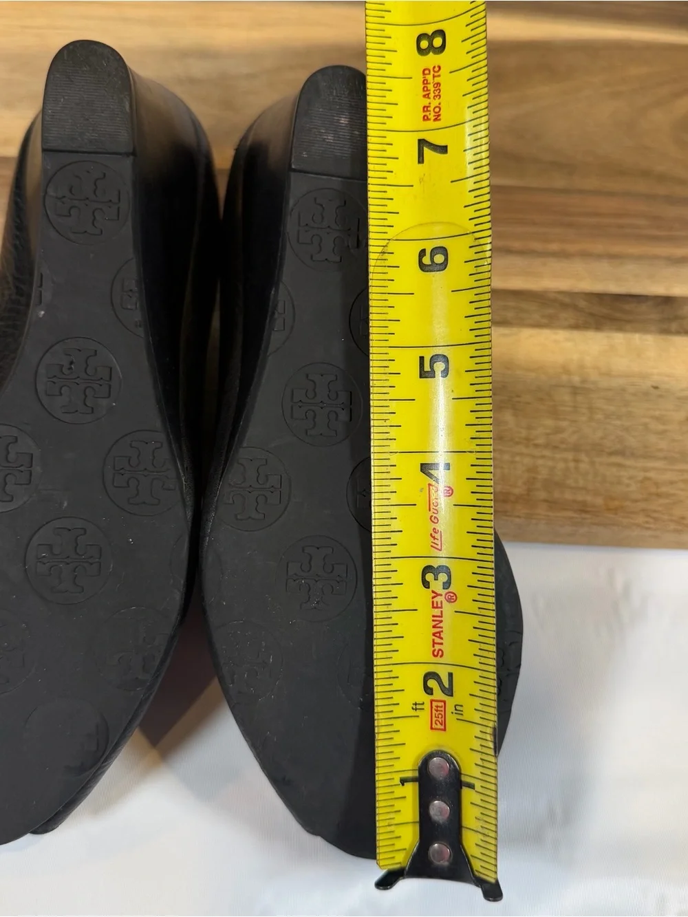 Tory Burch Black Leather Peep-Toe Wedge with Logo Medallion Sz 6?
